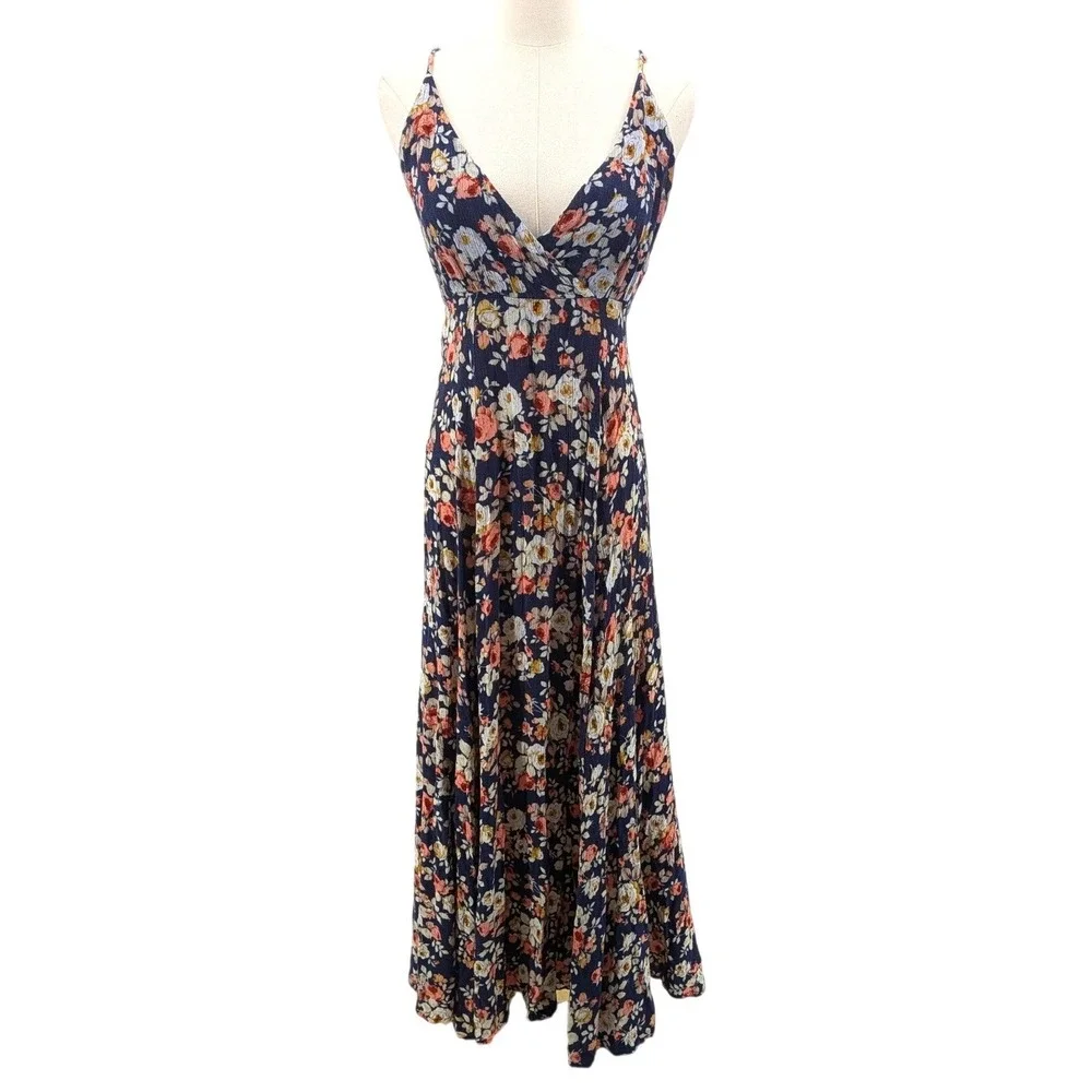 lulus boho dress Coral Floral Maxi Small Wrap Sleeveless Summer Beach Flow complete with a series of floral prints that create a cute striped pattern 23 Best Honeymoon Dresses -